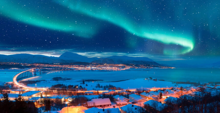 Aurora Borealis over Alaska, Northern Light Tours with expert guides, hot springs excursions.