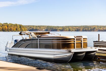 Couple enjoying luxury sunset cruise with Panama City Pontoon Charters in Florida waters